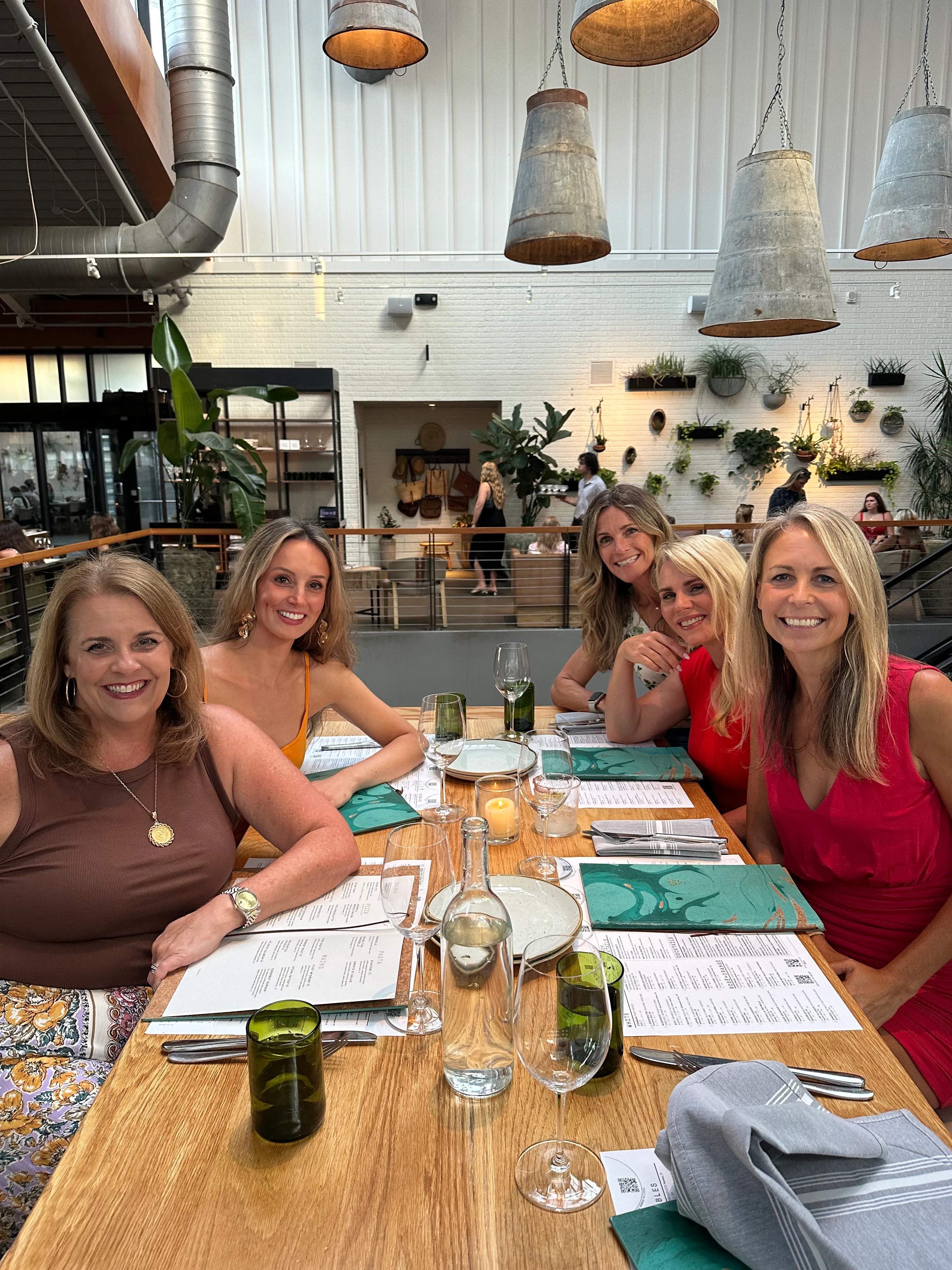 Carina and friends around the table at a Sixty Vines dinner