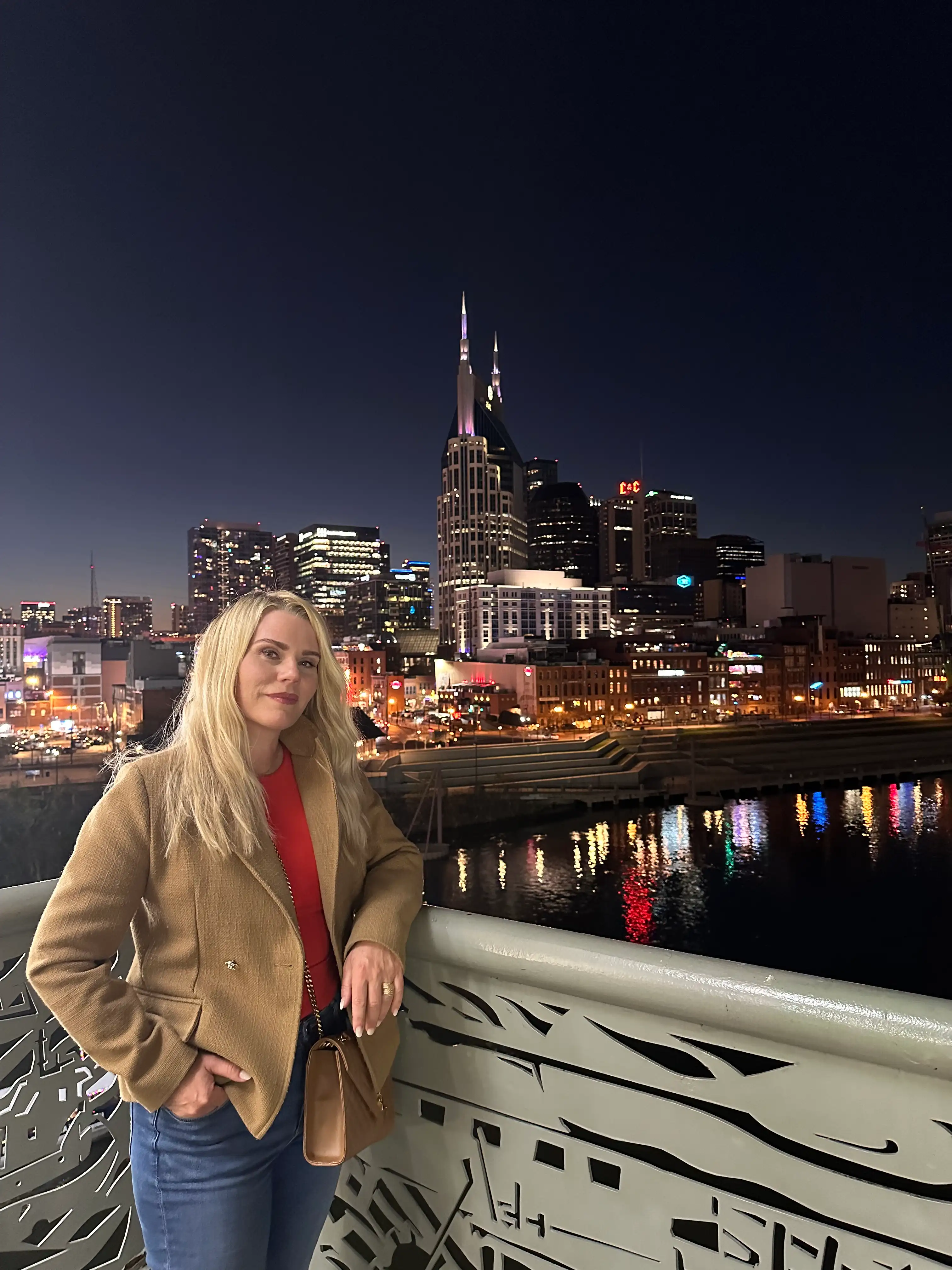 Carina Dahlmann on the pedestrian bridge with the Nashville skyline in the background